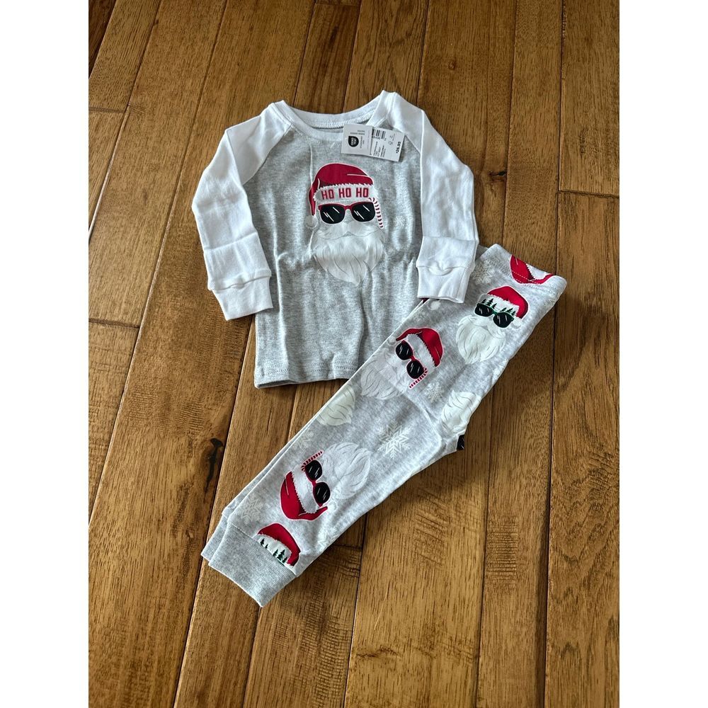 New, PJ place Christmas pajamas size 6 to 9 months Santa two piece with tag‎